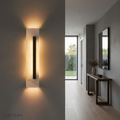 Porto marble wall lamp in a hallway with warm evening lighting and subtle shadows