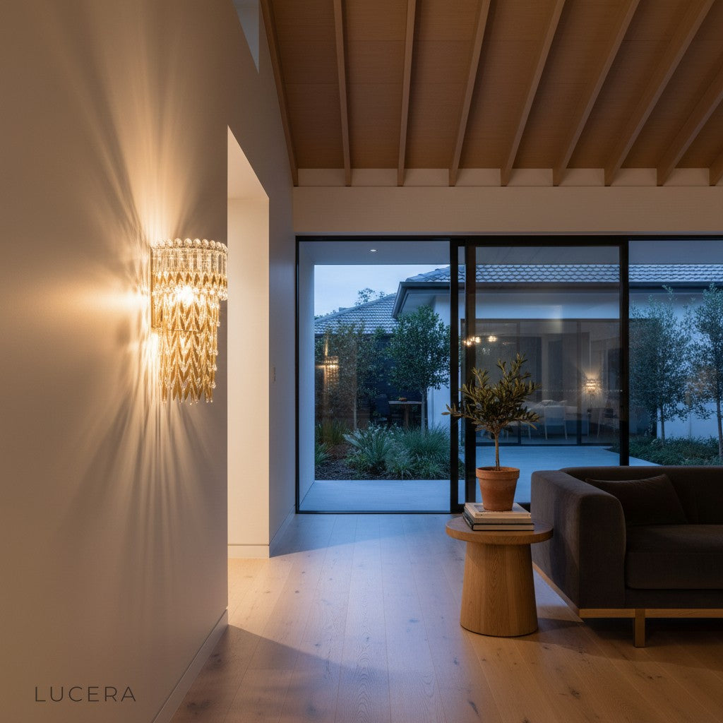 Luxurious Sera wall lamp in modern hallway with soft golden glow and reflective surfaces