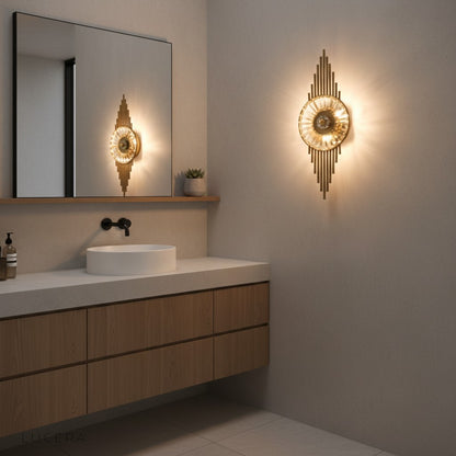 Lumiere Crystal Wall Lamp in warm daylight mode above velvet armchair in stylish lounge