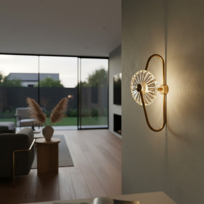 Close-up of Fresco wall lamp crystal refracting warm amber LED light
