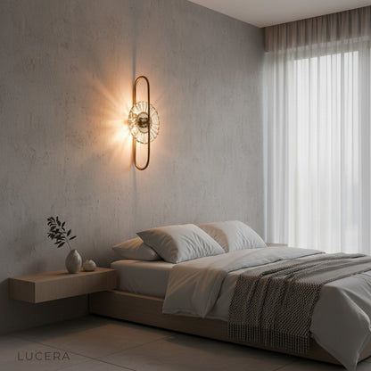 Fresco wall lamp crystal and iron texture detail against dark wall