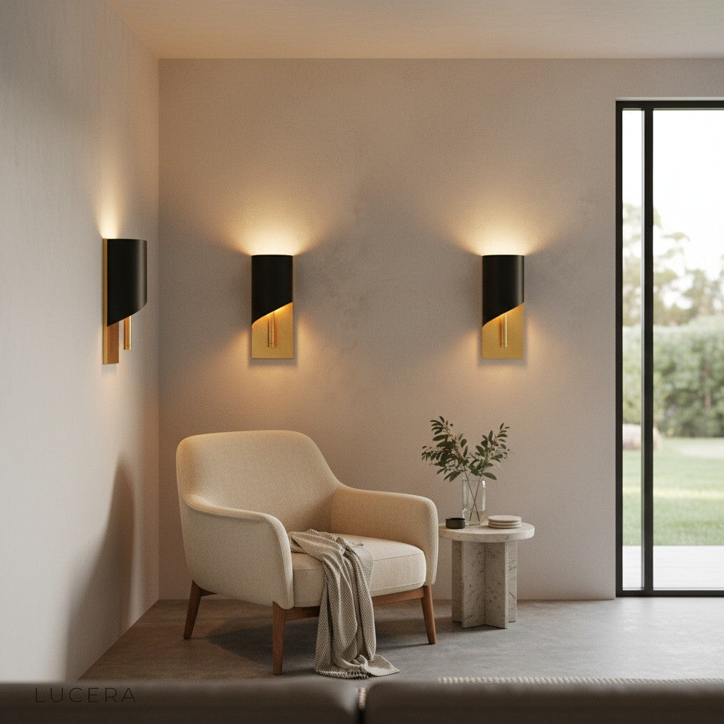 Duomo modern copper sconce above a mid-century console table in a stylish entryway