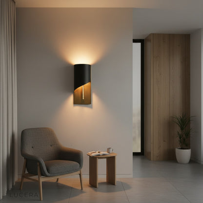 Aesthetic shot of Duomo sconce against textured wall, showing patina and warm LED beam