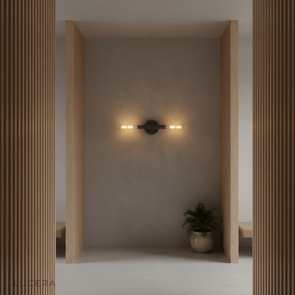 Ravello brass linear sconce above minimalist entryway console table