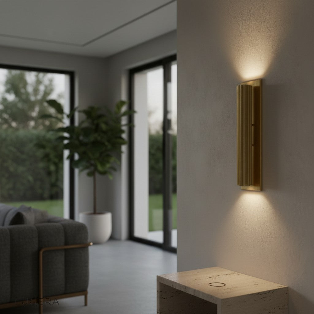 Loano classic wall sconce mounted in entryway with copper details against dark wall