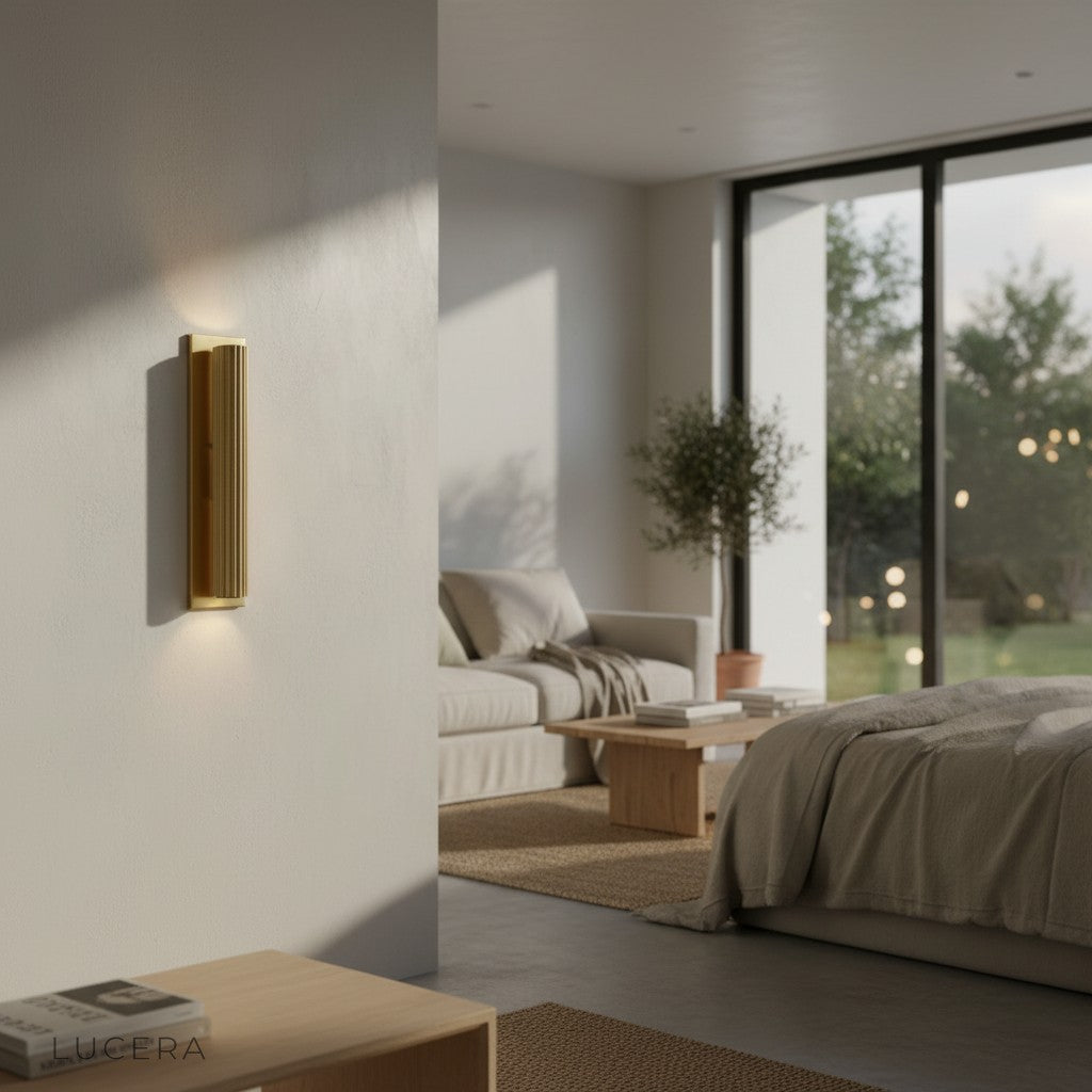 angled studio view of Loano American wall lamp showing curved arm and bulb position