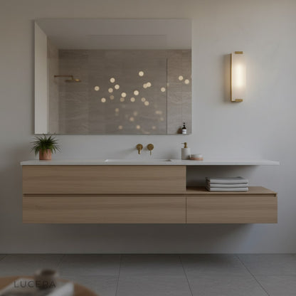 Damasse marble sconce mounted above modern console table in minimalist hallway