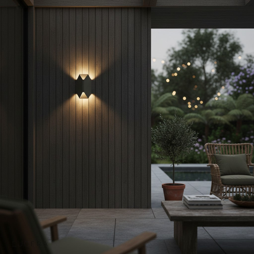 Nappe wall lamp as accent light above sofa in contemporary lounge setting