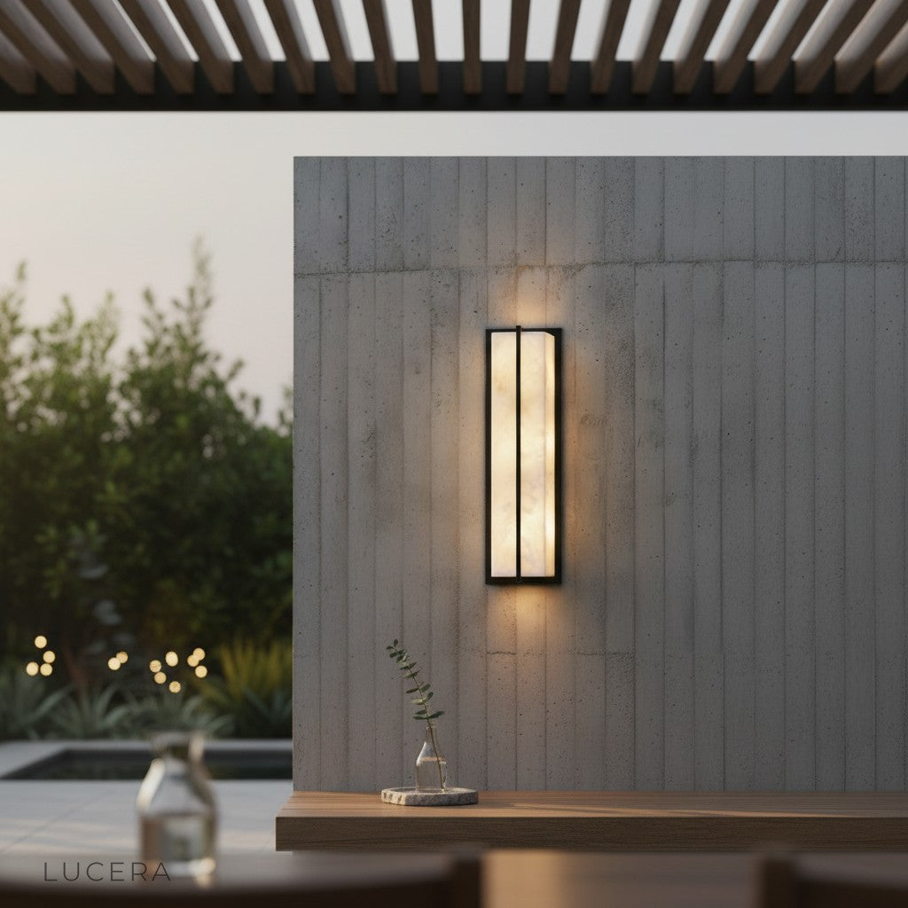 nighttime courtyard scene with the lamp glowing beside a wooden bench