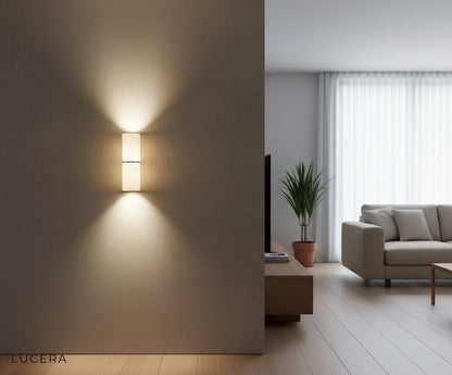 nighttime ambient shot of Vague marble lamp casting soft shadows in a serene bedroom corner