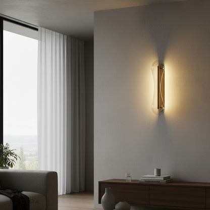 spire glass wall lamp casting soft glow in cozy bedroom at night