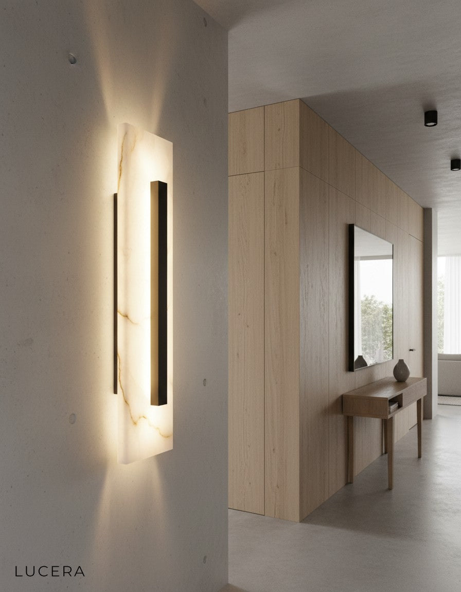 Nighttime lifestyle shot of Portico Neo lamp in a serene reading nook with bookshelf