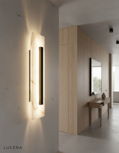 Nighttime lifestyle shot of Portico Neo lamp in a serene reading nook with bookshelf