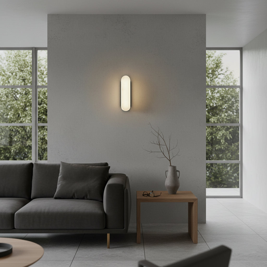 Abacus marble vertical wall lamp with brass accents glowing in a modern living room