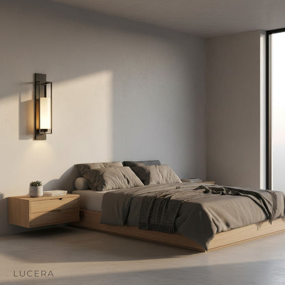 Palace style sconce with cool glow in chic minimalist dining room setting
