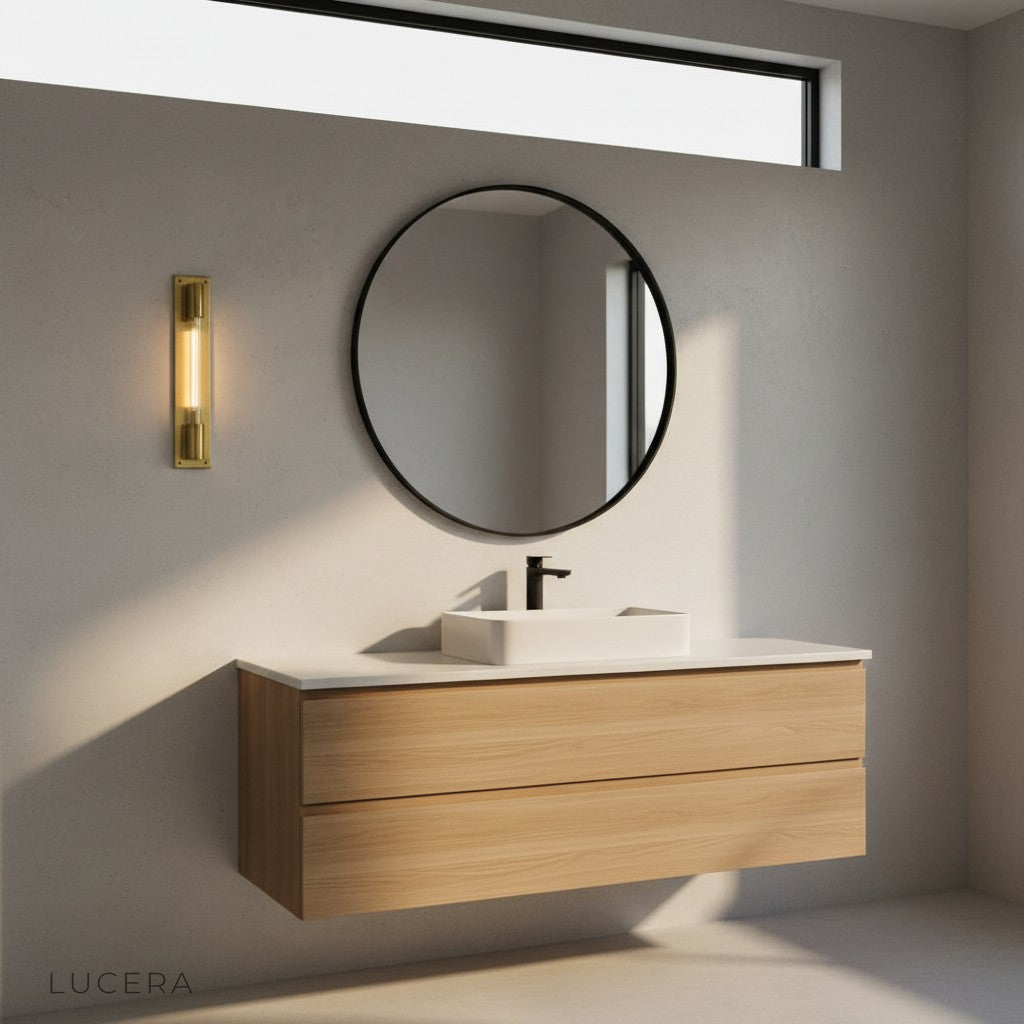 Nighttime ambiance of Verve bronze sconce lighting a cozy hallway with plants