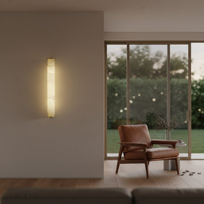 Nighttime lifestyle shot of Lucera wall lamp illuminating hallway with elegant Oriental silhouette