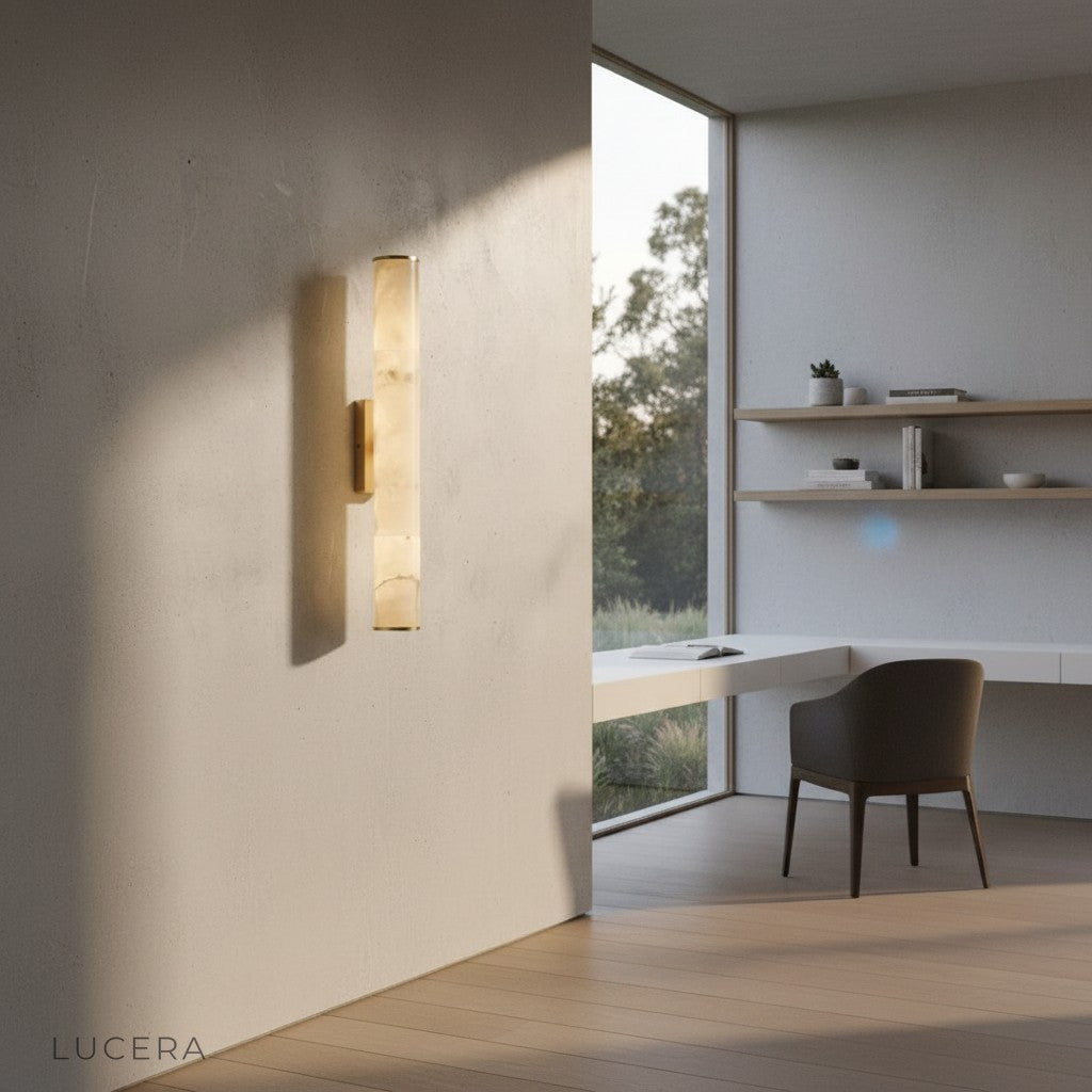 Ethos modern marble wall lamp in dimly lit reading nook with book and armchair ambiance