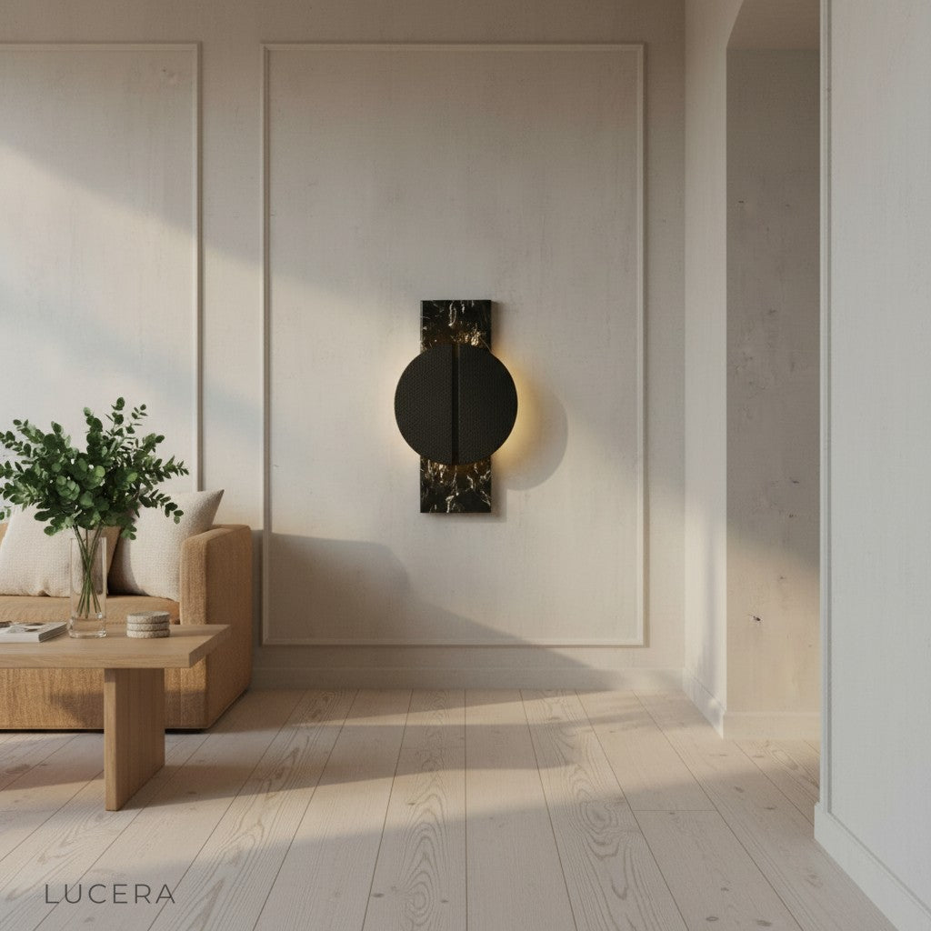 elegant wall lamp with warm glow highlighting marble surface and copper details