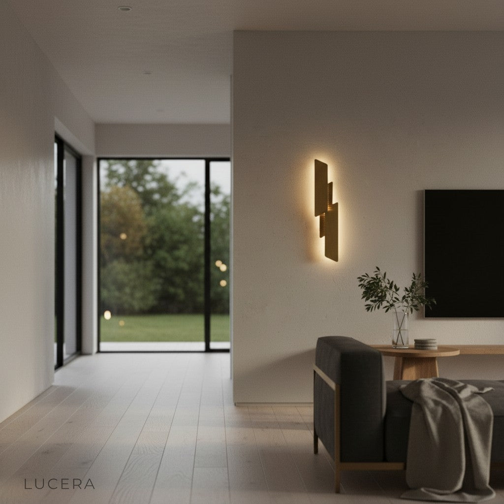 Industrial copper wall lamp mounted above sofa in cozy contemporary bedroom