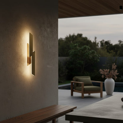 Lucera Myelin wall lamp with adjustable arm directed downward for reading nook