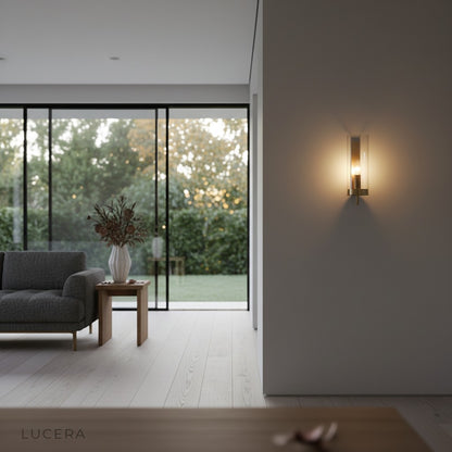 Blue Medial wall lamp illuminating a modern hallway with soft warm glow and elegant silhouette
