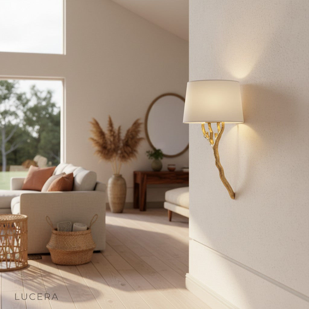 Sculptural branch lamp in minimalist hallway with warm light