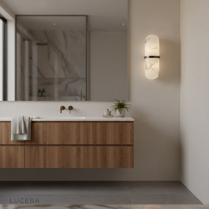 Luxury marble wall lamp paired with velvet sofa in elegant lounge