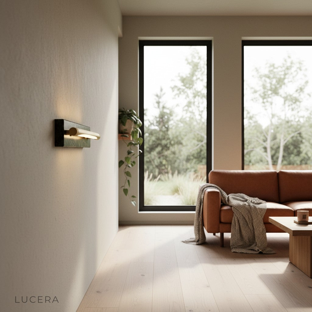 Marble and copper wall light in stylish reading nook with warm evening light
