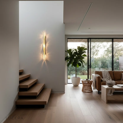 Marcato Nordic LED wall light at night casting warm shadows in bedroom
