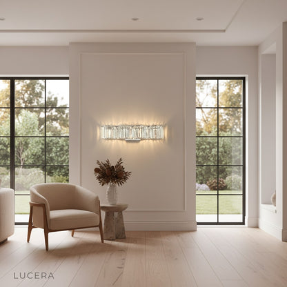 Vibrato crystal wall sconce in gold finish adding glamour to a formal dining room setting