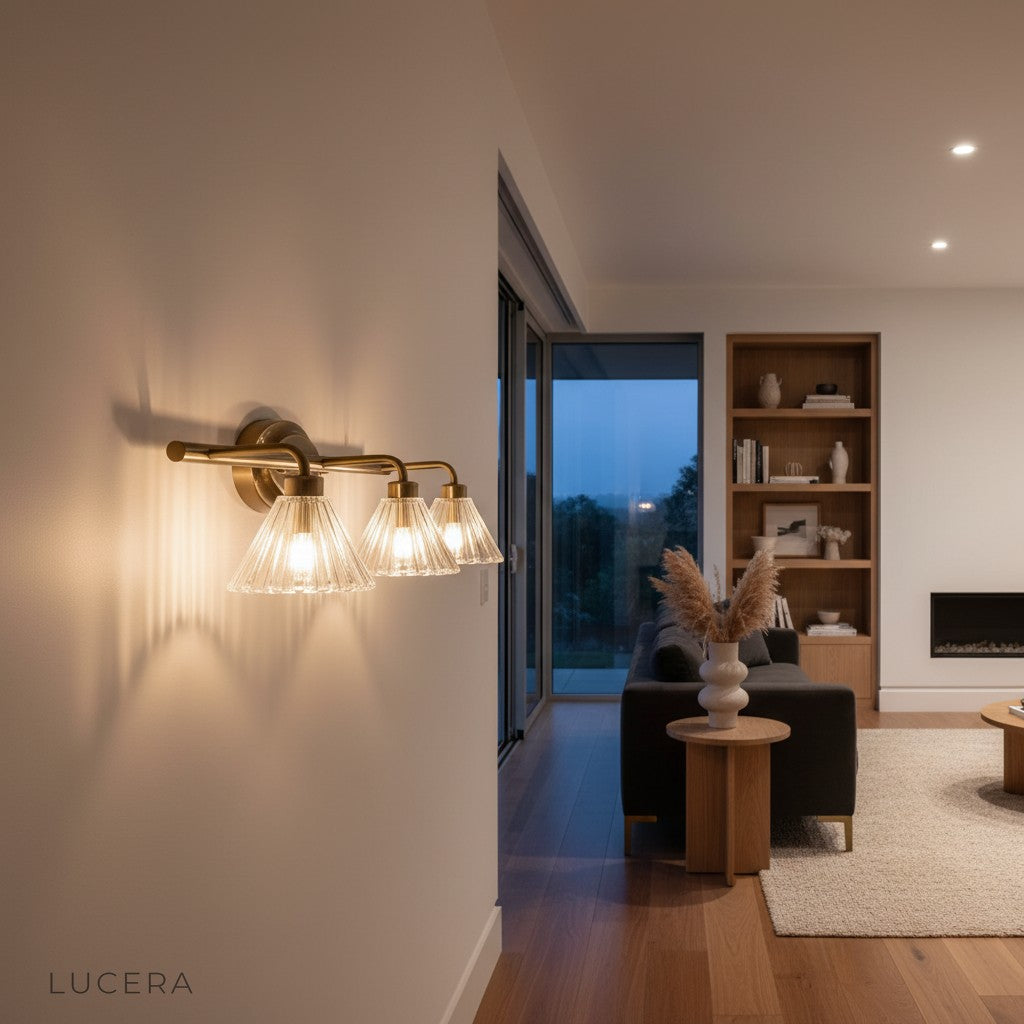 Lucera Pizzicato wall light glowing in a minimalist entryway at night