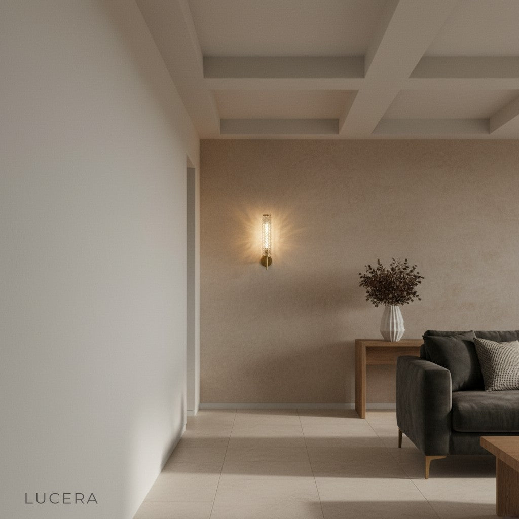 Nighttime lifestyle shot of Solo wall light glowing in a reading nook