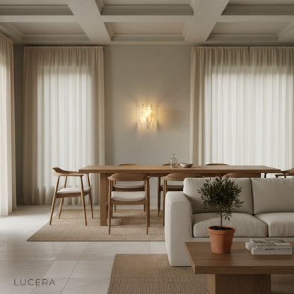 Soli chandelier in a bright hallway with white walls and subtle shadows