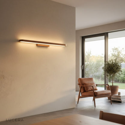 Sforzando sconce in a boutique hotel corridor with soft ambient lighting at dusk