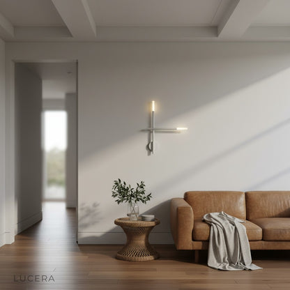 contemporary LED wall lamp with cool white light highlighting textured wall in modern office