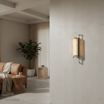 elegant crystal wall light above sofa in contemporary living space