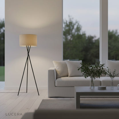 Venus Floor Lamp casting cozy light in a bedroom corner with soft decor