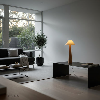 ambient evening shot of Lucera garden floor lamp casting soft light on patio