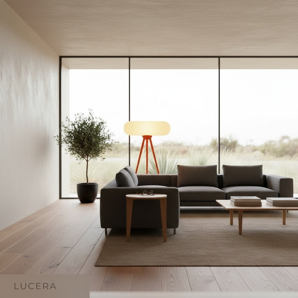 Juncture Floor Lamp casting soft ambient light in cozy bedroom at dusk