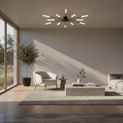 Karma chandelier in luxury hotel-style lounge with velvet chairs and warm accent lighting