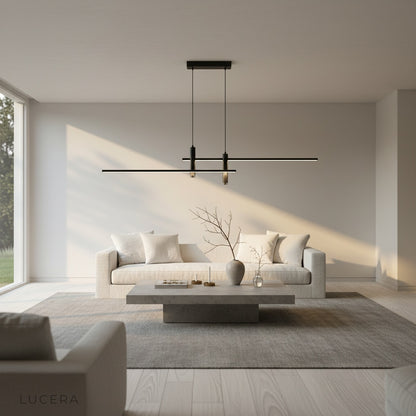 Red acrylic pendant light casting inviting glow over reading nook with armchair