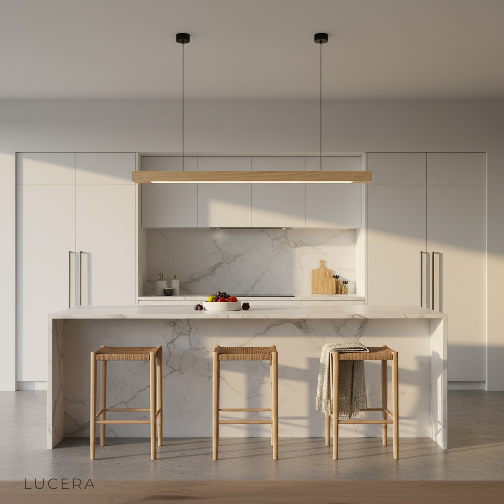 Kirsch pendant light in warm pine finish above a dining table, soft downward light