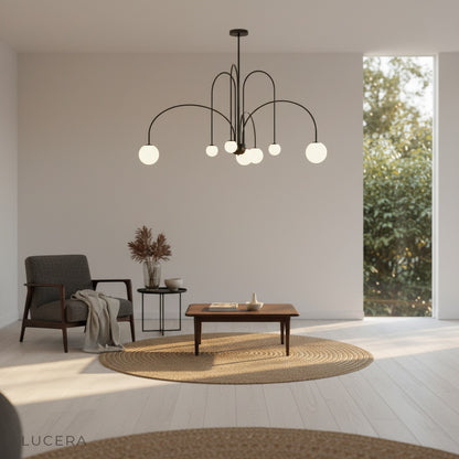 Unico Chandelier illuminated at dusk in cozy dining nook with soft shadows