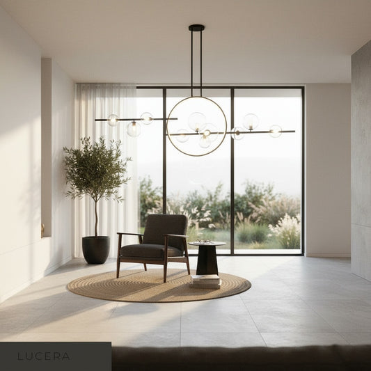studio shot of Zona chandelier with transparent blown glass globes on black frame