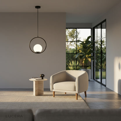 Zigolo pendant light chrome finish hanging centered against grey backdrop