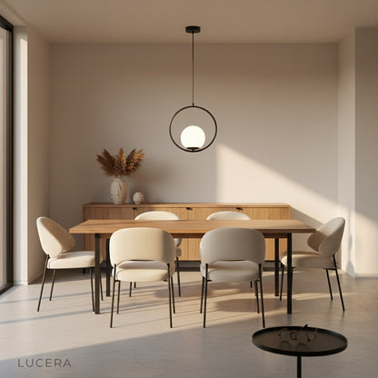 Close-up of Zigolo pendant light glass fixture and iron frame details
