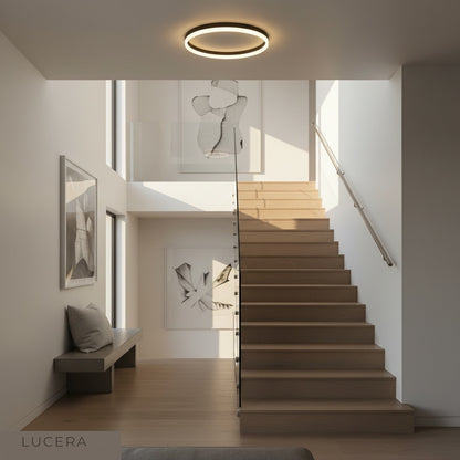bright ceiling lamp illuminating stylish home entryway