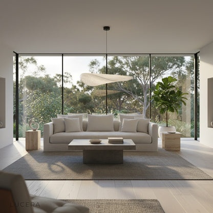 Eridanus pendant light floating cloud-like above a stylish entryway console