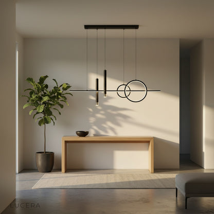 Black finish variant of Trim Pendant Light hanging in minimal entryway with soft daylight